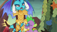 Ember pushing Spike out of the way S6E5