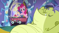 Pinkie Pie passes by Sludge with snacks S8E24