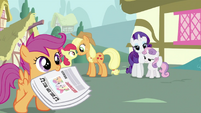 Scootaloo with a newspaper S2E23