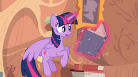 Twilight hovers while reading a book S4E03