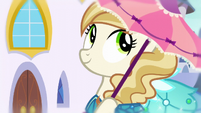 Pony wears a Princess Dress and holds a parasol S5E14