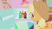 Applejack looks at bottled soda S1E04