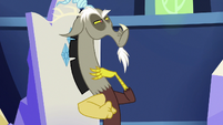 Discord pouting angrily at Spike S6E17