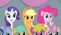 Rarity, Applejack, and Pinkie watching aerial relay S4E24