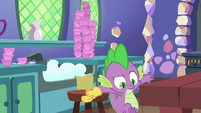 Spike jumping off the footstool S7E2