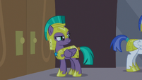 Guard Chrysalis looks at guards behind her S9E17