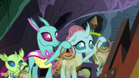 Ocellus and changelings holding lanterns S8E16
