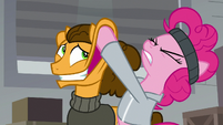 Pinkie pulls Cheese's cheeks upward S9E14