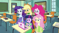 Twilight and friends in front of a laptop EG