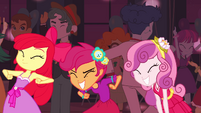 Dancing and having a great time with Scootaloo and Apple Bloom.