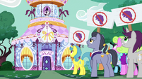 Ponies with anti-Rarity picket signs S7E14