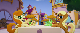 Apple family members holding up pies MLPTM