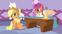 Applejack pulling on Starstreak's sewing fabric S7E9