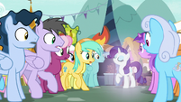 Rarity appears in the crowd of ponies S7E19