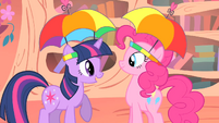 Pinkie Pie and Twilight with umbrella hats S1E15