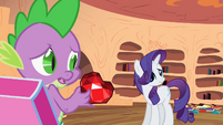 Rarity tries to avoid looking at the gem S2E10