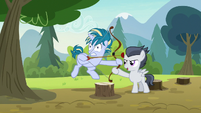 Rumble holding Skeedaddle's archery bow S7E21