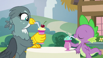 Spike and Gabby having milkshakes at the cafe S9E19