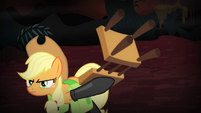 Applejack holding a lion-taming chair S4E17