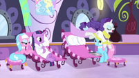 Rarity leaps off of the spa chair MLPS1