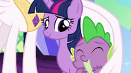 Spike laughing under Celestia's wing S7E1