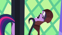 Twilight Sparkle looks at hole in library door S7E19