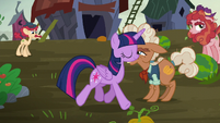 Twilight trotting past Ma Hooffield S5E23