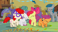 Sweetie Belle dancing among friends.