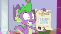 Spike shows off Shining Armor's scroll S9E4