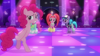 Pinkie Pie backing out of the club area S6E9