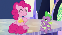 Pinkie happily eats the fake cupcake S9E14