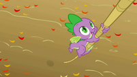 Spike climbing up S1E13