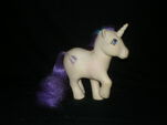 Another movie special pony. She seems to be very similar to Rarity in terms of color scheme.