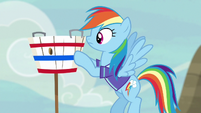 Rainbow Dash sets up the goal basket S6E18