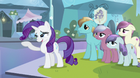 Rarity flicking her beautiful hair.