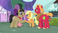 Young Applejack and Filthy Rich shaking hooves S6E23