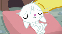 Fluttershy lying exhausted on a pillow S9E18