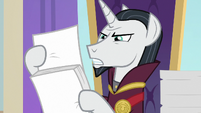 Neighsay looking over paperwork S8E26