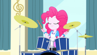 Pinkie Pie sitting in front of her drum set SS10