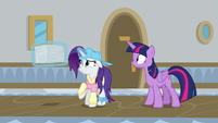 Rarity holding a stack of worksheets S8E16