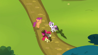 The CMC standing in a field S4E21