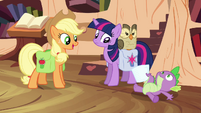 Twilight and Applejack see Spike on the floor S03E11