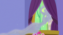 Wisps of flame fly out Spike's windows S9E19