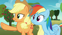 Applejack pointing over the hill S8E5