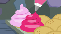 Cupcakes being frosted S8E24