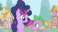 Spike patting Twilight's fluffy mane S1E1