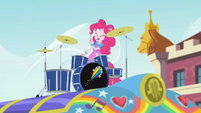 Pinkie Pie plays drums on top of the tour bus SS13