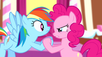 Pinkie Pie staring seriously at Rainbow S4E12