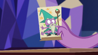 Spike holding Garbunkle character stand S6E17