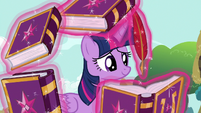 Twilight signs the collector ponies' journals S7E14